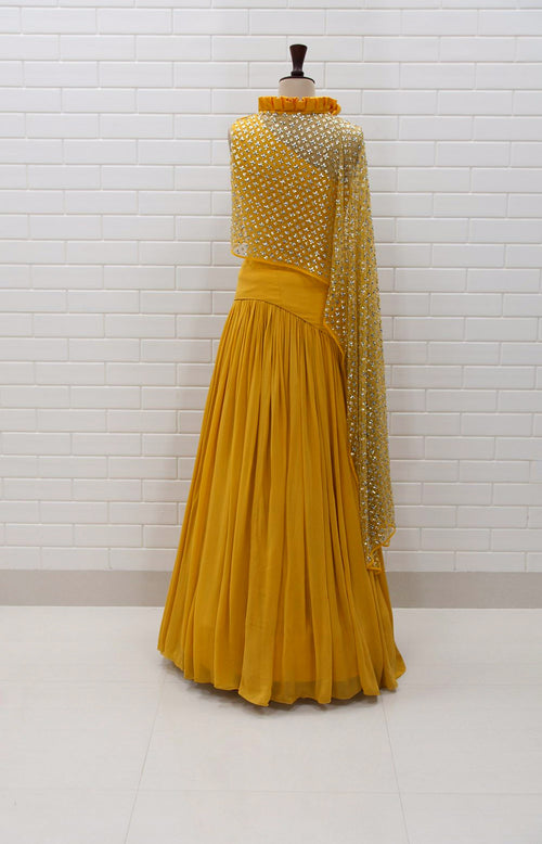 ABRIANA : Spicy Mustard Kundan Drape sleeveless Top with box pleated collar and Lehenga