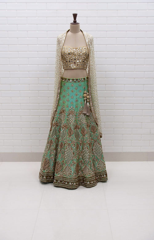 Sunny : Turquoise Lehenga with Mirror Corset and Kundan cowl jacket