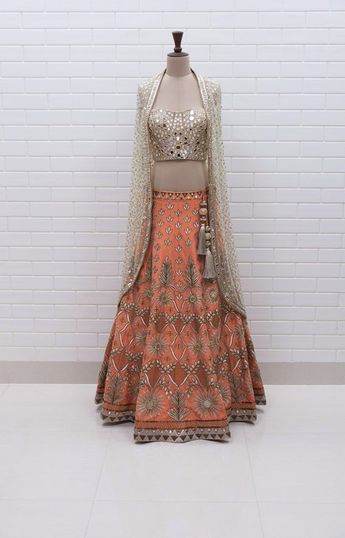 Peach Lehenga with Mirror Corset and Kundan cowl jacket